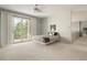 Bedroom with a queen-size bed and access to a private deck at 7 Elk Pointe Ln, Castle Rock, CO 80108