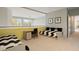 Bedroom with twin bed, desk and built-in shelving at 7 Elk Pointe Ln, Castle Rock, CO 80108