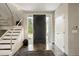 Bright and spacious entry with modern staircase and flooring at 7 Elk Pointe Ln, Castle Rock, CO 80108
