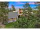 Modern home with attached garage and landscaping at 7 Elk Pointe Ln, Castle Rock, CO 80108