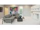 Relaxing basement sitting area with comfortable sectional sofa and built-in shelving at 7 Elk Pointe Ln, Castle Rock, CO 80108