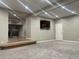 Finished basement with neutral carpeting and recessed lighting at 3092 S Kearney St, Denver, CO 80222