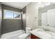 Updated bathroom with granite vanity and shower at 3092 S Kearney St, Denver, CO 80222