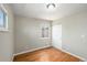 Well-lit bedroom featuring hardwood floors at 3092 S Kearney St, Denver, CO 80222