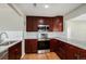 Updated kitchen, featuring granite countertops and stainless steel appliances at 3092 S Kearney St, Denver, CO 80222