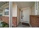 Inviting home exterior with brick facade and welcoming entryway at 17273 E Ford Dr, Aurora, CO 80017