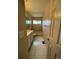 Clean bathroom with a tub, shower, vanity, and tiled flooring at 16580 E Hialeah Dr, Centennial, CO 80015