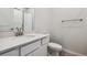 Clean bathroom with white vanity, quartz countertop and shower at 3362 N Highlands Creek Pkwy, Aurora, CO 80019