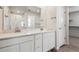 Elegant bathroom with double vanity and walk-in shower at 3362 N Highlands Creek Pkwy, Aurora, CO 80019