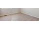 Simple carpeted bedroom with neutral walls and a window at 3362 N Highlands Creek Pkwy, Aurora, CO 80019