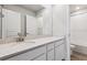 Clean bathroom boasts a double vanity and a shower/tub combo at 3362 N Highlands Creek Pkwy, Aurora, CO 80019