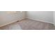 Simple carpeted bedroom with neutral walls and double door closet at 3362 N Highlands Creek Pkwy, Aurora, CO 80019