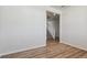 Office with hardwood floors and view into hallway and stairs at 3362 N Highlands Creek Pkwy, Aurora, CO 80019