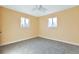 Well-lit bedroom featuring a ceiling fan and neutral wall colors at 862 N Uvalda St, Aurora, CO 80011