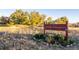 Entrance to Ute Trail Gardens with signage and landscaping at 2290 S Braun Way, Lakewood, CO 80228