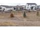 Aerial view of the house from across the street at 12722 Cove St, Firestone, CO 80504