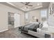 Spacious main bedroom with barn door to en-suite bathroom at 12722 Cove St, Firestone, CO 80504