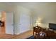 Home office with hardwood floors and large closet at 6678 S Shawnee Ct, Aurora, CO 80016