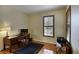 Home office with hardwood floors and built-in desk at 6678 S Shawnee Ct, Aurora, CO 80016