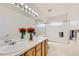 Bright bathroom with double sinks and a shower at 6972 Hampton Ct, Castle Pines, CO 80108