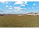 Open green space with a pergola and benches at 944 Savona Ave, Fort Lupton, CO 80621