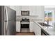 Modern kitchen with stainless steel appliances at 944 Savona Ave, Fort Lupton, CO 80621