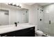 Basement bathroom with a modern shower and vanity at 2009 S Clarkson St, Denver, CO 80210