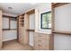 Large walk-in closet with ample shelving and drawers at 2009 S Clarkson St, Denver, CO 80210