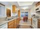 View of kitchen and dining area, showcasing the open floor plan at 10812 W Evans Ave # 13, Lakewood, CO 80227