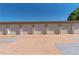 Row of garages with individual numbered doors at 13609 E Cornell Ave # 107, Aurora, CO 80014