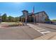 Building exterior with landscaping and parking at 13609 E Cornell Ave # 107, Aurora, CO 80014