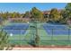 Two well-maintained tennis courts at 13609 E Cornell Ave # 107, Aurora, CO 80014