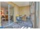 Sunroom with tiled floor, and plenty of natural light at 13609 E Cornell Ave # 107, Aurora, CO 80014