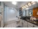 Basement bathroom with a modern vanity and bathtub at 107 Fairfield Ln, Louisville, CO 80027