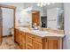 Large bathroom with double vanity, walk-in shower, and separate toilet at 180 Emmett Lode Rd, Breckenridge, CO 80424