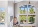 Vaulted ceilings and expansive windows with mountain views at 180 Emmett Lode Rd, Breckenridge, CO 80424