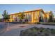 Exterior view of a community center with landscaping at 18636 E 45Th Pl, Denver, CO 80249