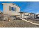 Two-story home with a brick facade and a welcoming front porch at 17899 E Princeton Pl, Aurora, CO 80013