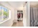 Neat closet with clothes hanging and shelves for storage at 624 Stuart St, Denver, CO 80204