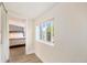 Clean hallway with light walls and wood-look flooring at 624 Stuart St, Denver, CO 80204
