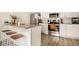 Updated kitchen featuring granite countertops and island with seating at 624 Stuart St, Denver, CO 80204