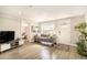 Bright living room with hardwood floors and access to backyard at 624 Stuart St, Denver, CO 80204