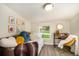 Cozy bedroom with daybed, desk, and backyard view at 624 Stuart St, Denver, CO 80204