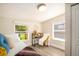 Charming bedroom with window seat and backyard view at 624 Stuart St, Denver, CO 80204
