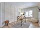 Bright home office with wood-look floors, built-in shelving, and a window with natural light at 10074 Matthew Ln, Littleton, CO 80130