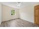 Spacious bedroom featuring hardwood floors and a window with natural light at 3089 W 18Th Ave, Denver, CO 80204