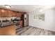 Cozy kitchen with stainless steel appliances and wood cabinets at 420 Willow Dr, Lochbuie, CO 80603