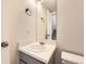 Small bathroom with single sink vanity and toilet at 388 Evans Blvd, Elizabeth, CO 80107