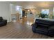 Open floor plan with a view of the kitchen and staircase at 1266 S Ammons St, Lakewood, CO 80232