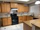 Well-equipped kitchen with ample counter space and storage at 1266 S Ammons St, Lakewood, CO 80232